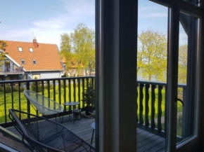Cozy modern apartment with lagoon view, Preila